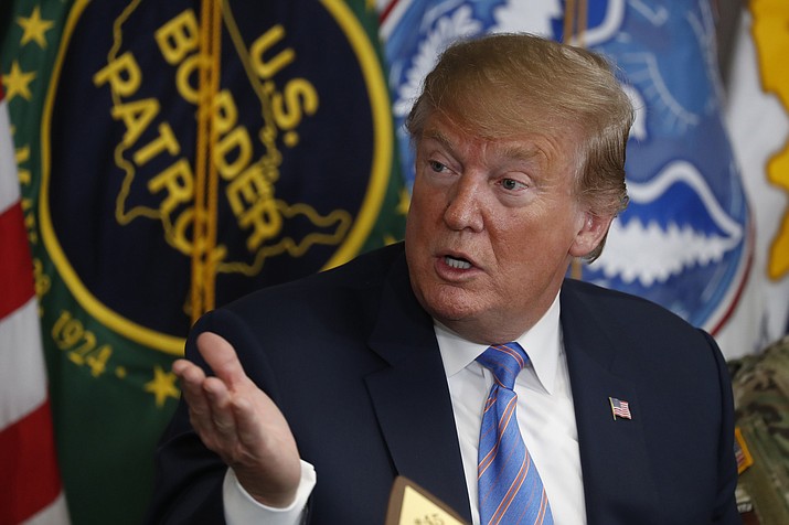 In this April 5, 2019 photo, President Donald Trump participates in a roundtable on immigration and border security at the U.S. Border Patrol Calexico Station in Calexico, Calif. Trump said Friday he is considering sending "Illegal Immigrants" to Democratic strongholds to punish them for inaction— just hours after White House and Homeland Security officials insisted the idea was dead on arrival. (Jacquelyn Martin/AP, file)