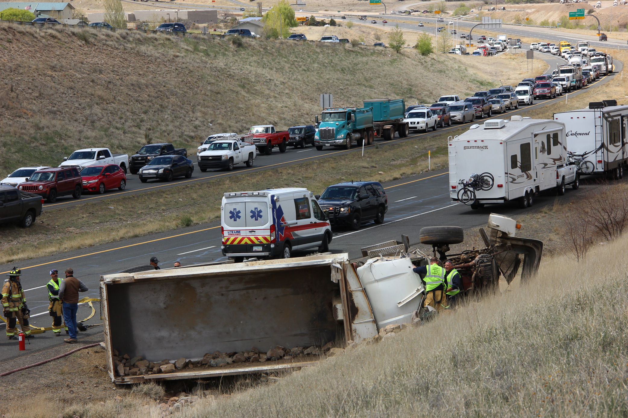 Dump truck rolls on Highway 89A; driver seriously injured | The Daily ...