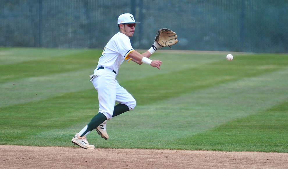 Yavapai's Channy Ortiz chases down a ball at shortstop as the Roughriders take on Gateway Community College Wednesday, April 17 at in Prescott. (Les Stukenberg/Courier)