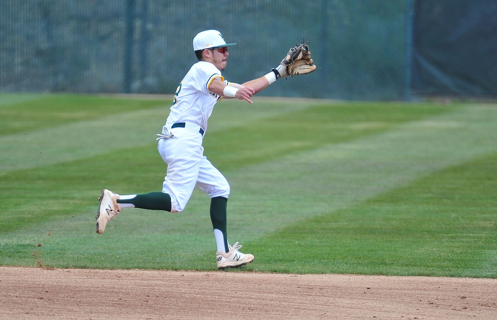 Yavapai's Channy Ortiz chases down a ball at shortstop as the Roughriders take on Gateway Community College Wednesday, April 17 at in Prescott. (Les Stukenberg/Courier)
