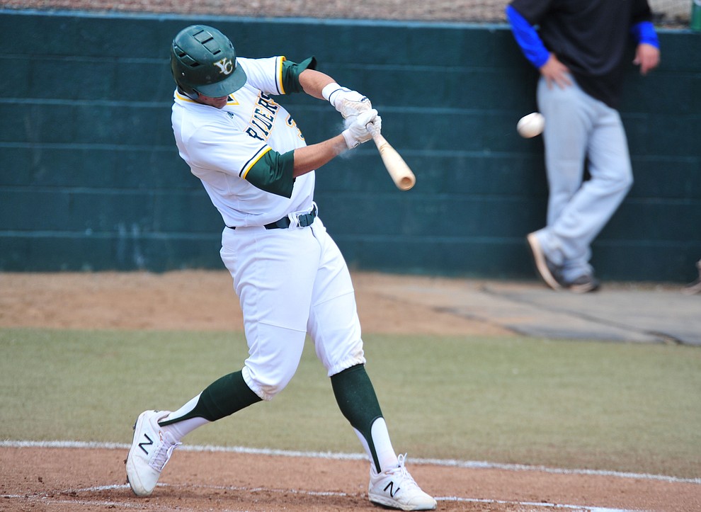 Yavapai's Jack Silverman makes contact as the Roughriders take on Gateway Community College Wednesday, April 17 at in Prescott. (Les Stukenberg/Courier)