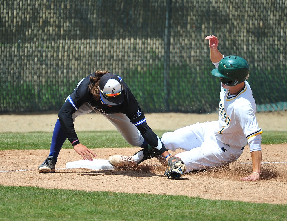 Yavapai's Will Long slides safely into third as the Roughriders take on Gateway Community College Wednesday, April 17 at in Prescott. (Les Stukenberg/Courier)