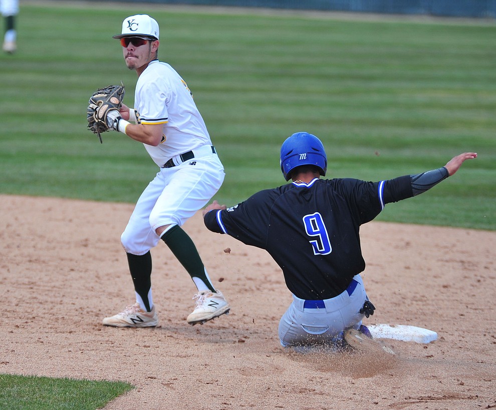 Yavapai's Channy Ortiz truns the front end of a double play as the Roughriders take on Gateway Community College Wednesday, April 17 at in Prescott. (Les Stukenberg/Courier)