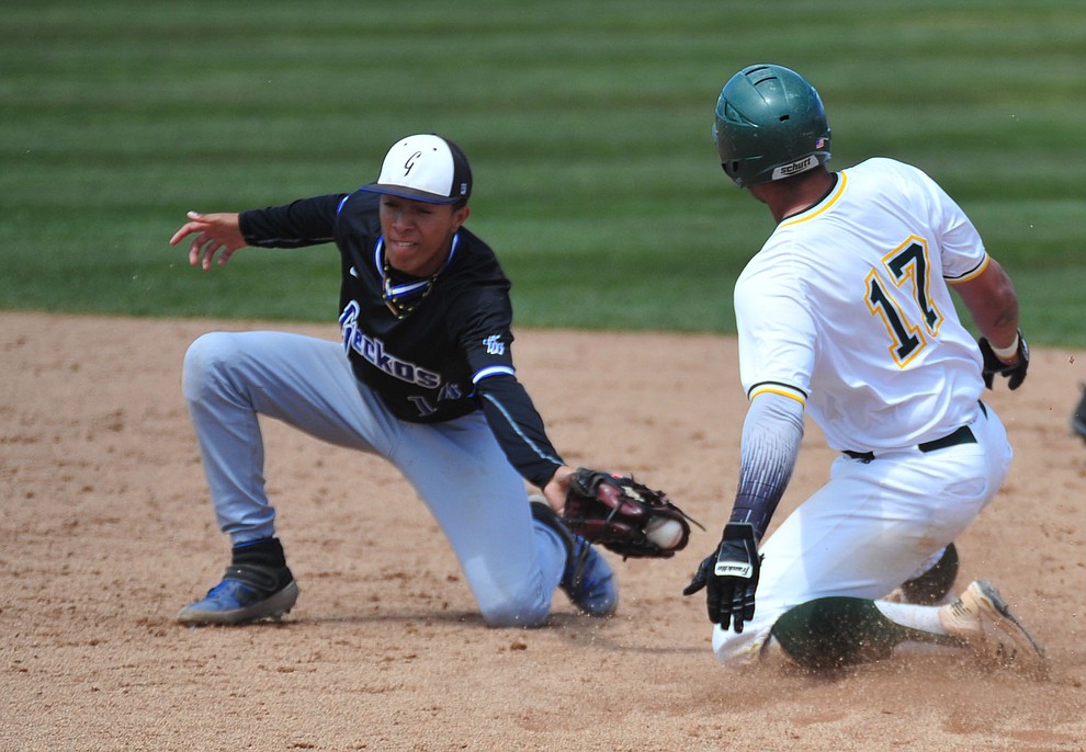 Yavapai's Christian Encarnacion-Strand steals second as the Roughriders take on Gateway Community College Wednesday, April 17 at in Prescott. (Les Stukenberg/Courier)