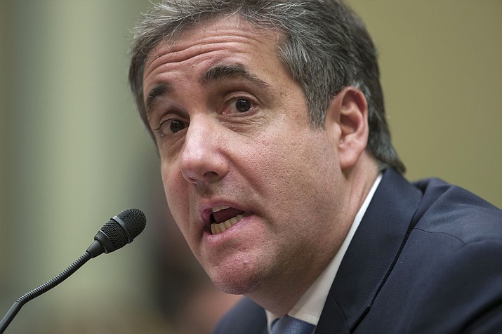 In this Feb. 27, 2019, file photo, Michael Cohen, President Donald Trump's former lawyer, testifies before the House Oversight and Reform Committee, on Capitol Hill in Washington. Mueller found some evidence in the redacted report released Thursday, April 18, that suggests Trump may have intended to discourage Cohen from cooperation. But he reached no conclusion on whether Trump obstructed justice. (Alex Brandon/AP, file)