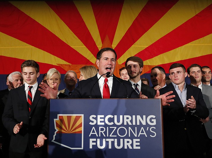 In this Nov. 6, 2018, file photo, Arizona Gov. Doug Ducey speaks to Republican supporters at an election night party in Scottsdale. Contributions to the Arizona Republican Party have fallen this year to their lowest level in nearly two decades, according to campaign finance records. (Matt York/AP, file)