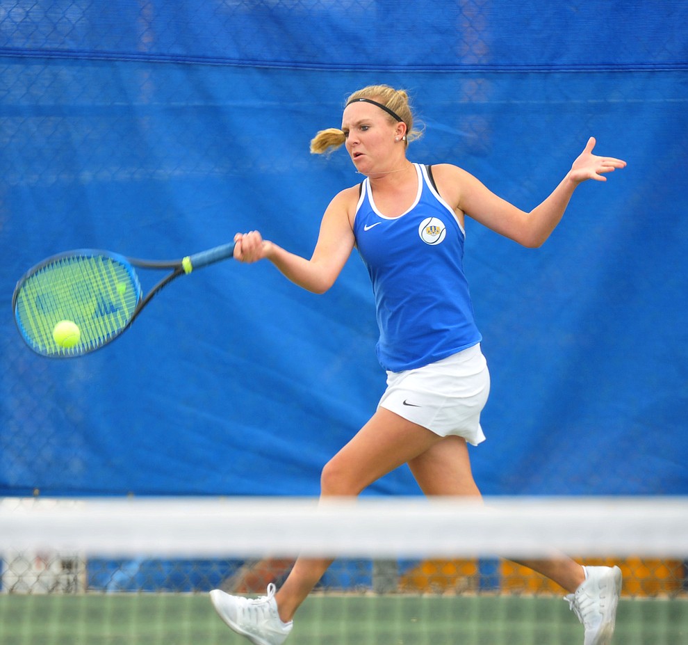 Prescott's Ava Andrews hits a return shot as the Badgers play Ironwood Ridge in the first round of the Arizona Interscholastic Association State Team Tennis Tournament Tuesday, April 23 in Prescott. (Les Stukenberg/Courier)