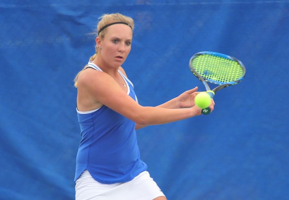 Prescott's Ava Andrews hits a return shot as the Badgers play Ironwood Ridge in the first round of the Arizona Interscholastic Association State Team Tennis Tournament Tuesday, April 23 in Prescott. (Les Stukenberg/Courier)