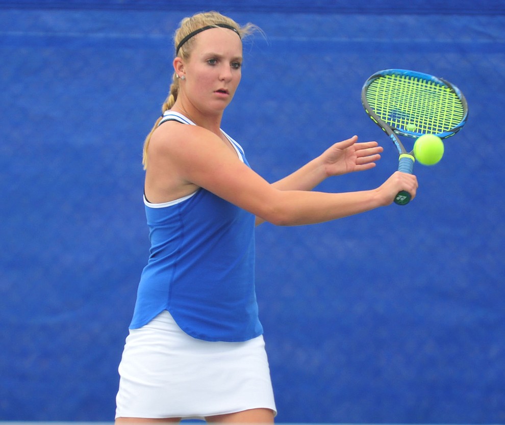 Prescott's Ava Andrews hits a return shot as the Badgers play Ironwood Ridge in the first round of the Arizona Interscholastic Association State Team Tennis Tournament Tuesday, April 23 in Prescott. (Les Stukenberg/Courier)