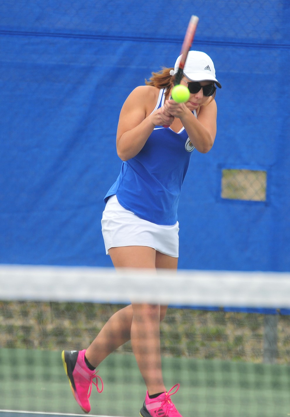 Prescott's Heidi Madsen hits a return shot as the Badgers play Ironwood Ridge in the first round of the Arizona Interscholastic Association State Team Tennis Tournament Tuesday, April 23 in Prescott. (Les Stukenberg/Courier)