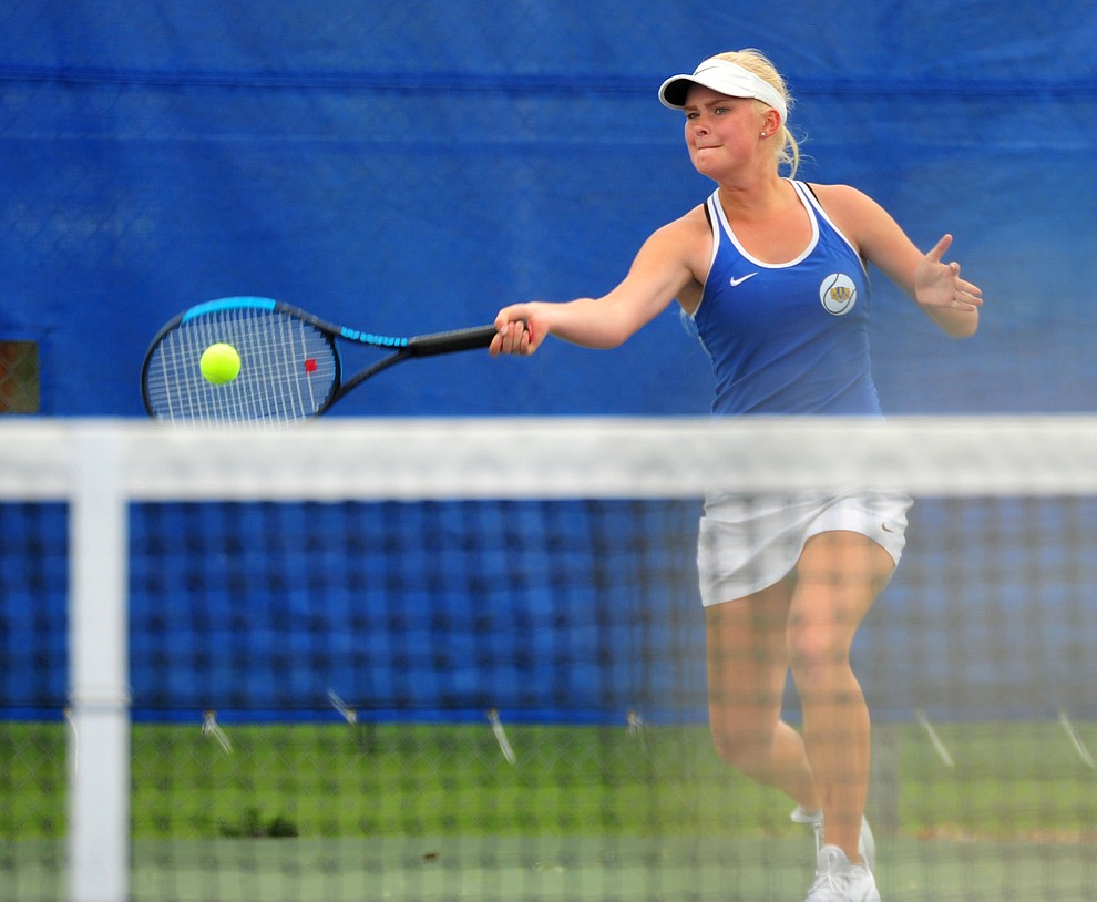 Prescott's Sierra McDonald hits a return shot as the Badgers play Ironwood Ridge in the first round of the Arizona Interscholastic Association State Team Tennis Tournament Tuesday, April 23 in Prescott. (Les Stukenberg/Courier)