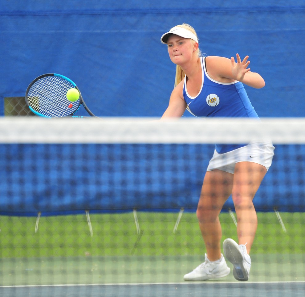 Prescott's Sierra McDonald hits a return shot as the Badgers play Ironwood Ridge in the first round of the Arizona Interscholastic Association State Team Tennis Tournament Tuesday, April 23 in Prescott. (Les Stukenberg/Courier)