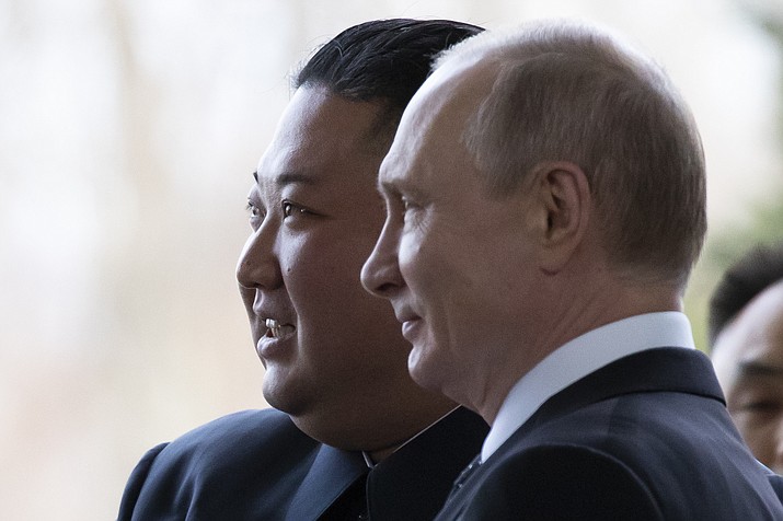 Russian President Vladimir Putin, right, and North Korea's leader Kim Jong Un pose for a photo prior to their talks in Vladivostok, Russia, Thursday, April 25, 2019. Putin and Kim are set to have one-on-one meeting at the Far Eastern State University on the Russky Island across a bridge from Vladivostok. The meeting will be followed by broader talks involving officials from both sides. (AP Photo/Alexander Zemlianichenko, Pool)