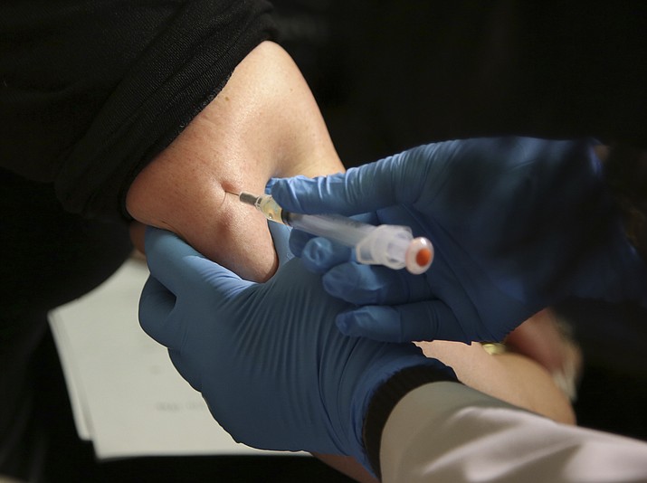 A woman receives a measles, mumps and rubella vaccine March 27, 2019, at the Rockland County Health Department in Pomona, N.Y. Measles cases in the U.S. this year have climbed to the highest level in 25 years, according to preliminary figures, a resurgence attributed largely to misinformation about vaccines. (Seth Wenig/AP, File)