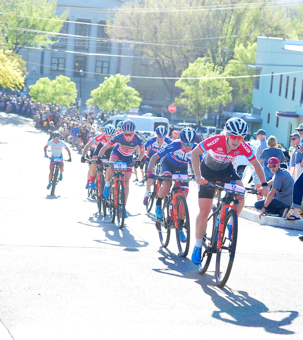 Chloe Woodruff takes the lead up Union Street during the Whiskey Off Road Fat Tire Crit through the streets of downtown Prescott Friday, April 26. (Les Stukenberg/Courier)