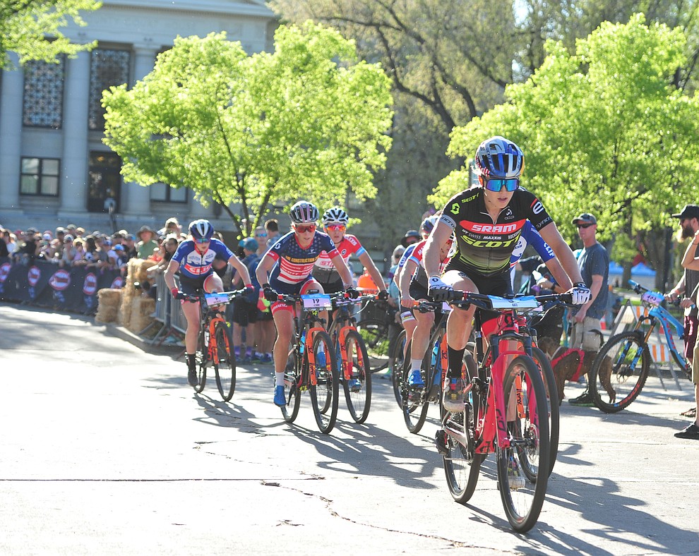 Kate Courtney leads during the Whiskey Off Road Fat Tire Crit through the streets of downtown Prescott Friday, April 26. (Les Stukenberg/Courier)