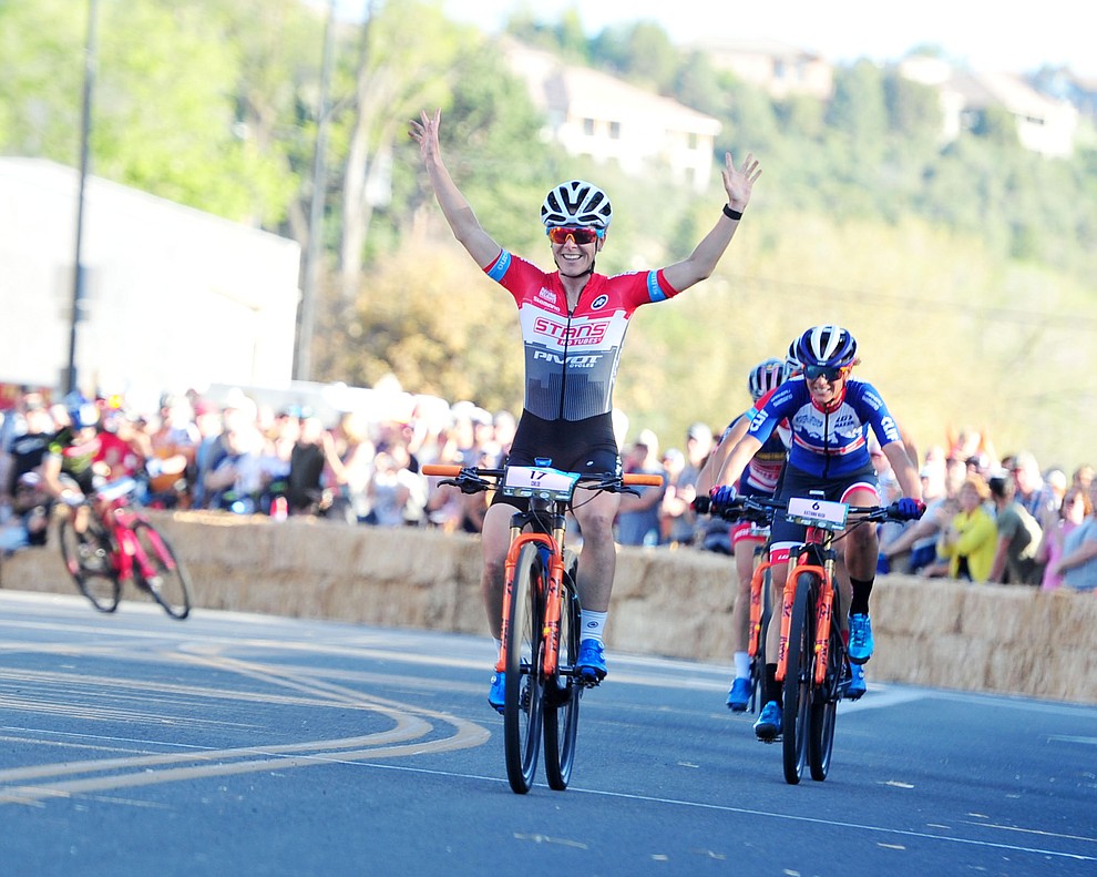 Prescott resident Chloe Woodruff wins the Whiskey Off Road Fat Tire Crit through the streets of downtown Prescott Friday, April 26. (Les Stukenberg/Courier)