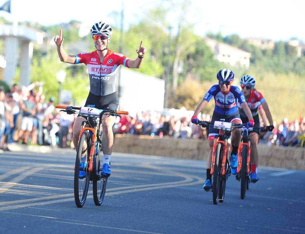 Prescott resident Chloe Woodruff wins the Whiskey Off Road Fat Tire Crit through the streets of downtown Prescott Friday, April 26. (Les Stukenberg/Courier)