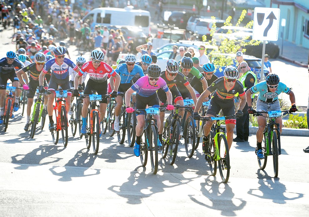 It was a battle especially early on during the Whiskey Off Road Fat Tire Crit through the streets of downtown Prescott Friday, April 26. (Les Stukenberg/Courier)