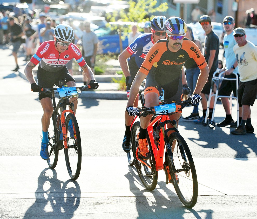 Payson McElveen takes the lead up Union Street during the Whiskey Off Road Fat Tire Crit through the streets of downtown Prescott Friday, April 26. (Les Stukenberg/Courier)