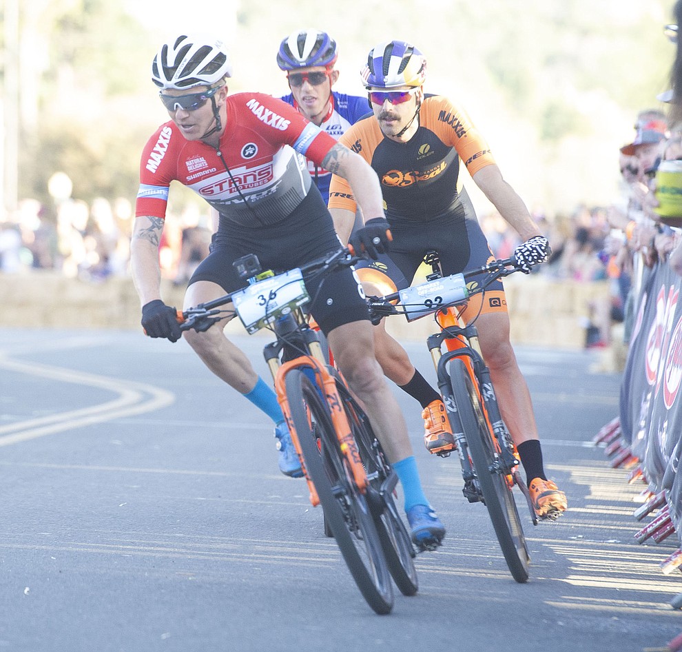 Keegan Swenson leads as they head up Union Street during the Whiskey Off Road Fat Tire Crit through the streets of downtown Prescott Friday, April 26. (Les Stukenberg/Courier)