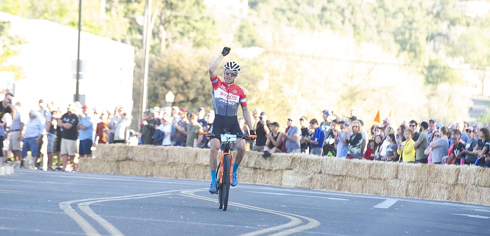 Keegan Swenson wins the Whiskey Off Road Fat Tire Crit through the streets of downtown Prescott Friday, April 26. (Les Stukenberg/Courier)