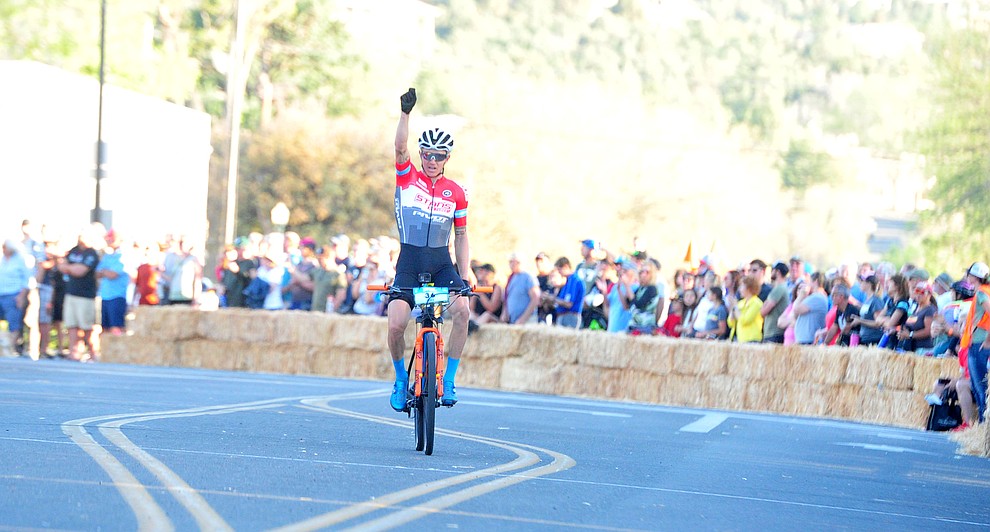 Keegan Swenson wins the Whiskey Off Road Fat Tire Crit through the streets of downtown Prescott Friday, April 26. (Les Stukenberg/Courier)