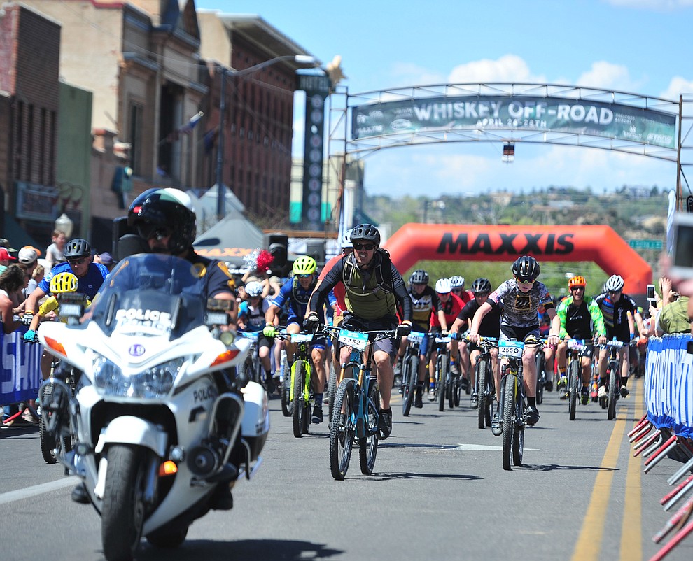 268 racers head out on the 15 mile course during the opening day of the Whiskey Off Road in downtown Prescott Friday, April 26. (Les Stukenberg/Courier)
