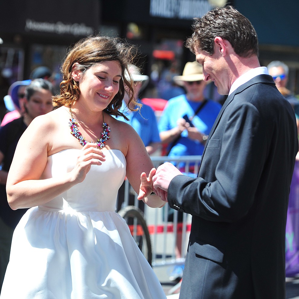 Greg and Bess Dougherty of Indinapolis, IN held their wedding ceremony on the start line on opening day of the Whiskey Off Road in downtown Prescott Friday, April 26. (Les Stukenberg/Courier)