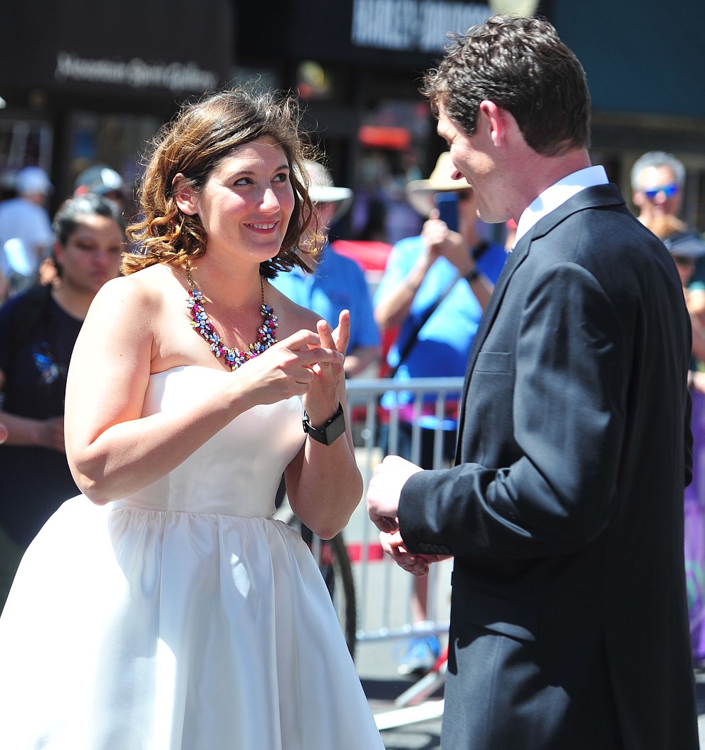 Greg and Bess Dougherty of Indinapolis, IN held their wedding ceremony on the start line on opening day of the Whiskey Off Road in downtown Prescott Friday, April 26. (Les Stukenberg/Courier)