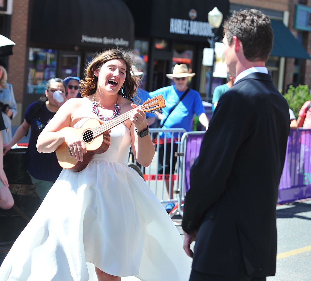 Greg and Bess Dougherty of Indinapolis, IN held their wedding ceremony on the start line on opening day of the Whiskey Off Road in downtown Prescott Friday, April 26. (Les Stukenberg/Courier)