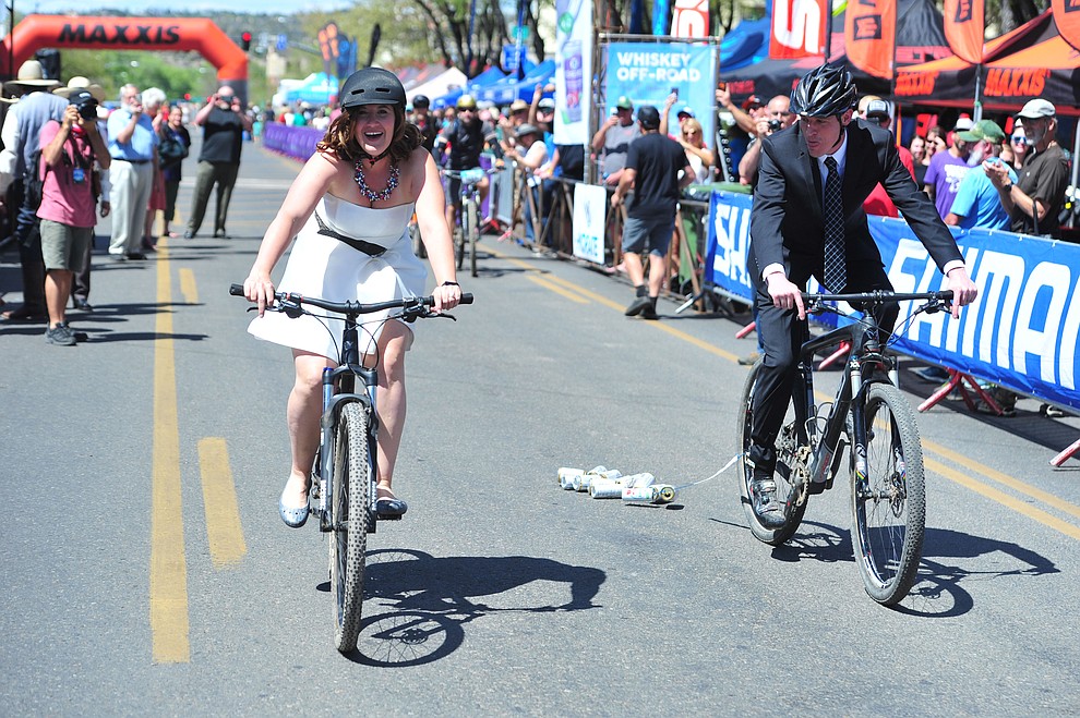 Greg and Bess Dougherty of Indinapolis, IN held their wedding ceremony on the start line on opening day of the Whiskey Off Road in downtown Prescott Friday, April 26 and then rode off together. (Les Stukenberg/Courier)