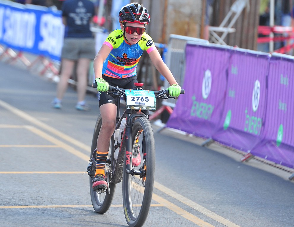 Sander Biesen crosses the finish line of the 15-mile race during the opening day of the Whiskey Off Road in downtown Prescott Friday, April 26. (Les Stukenberg/Courier)