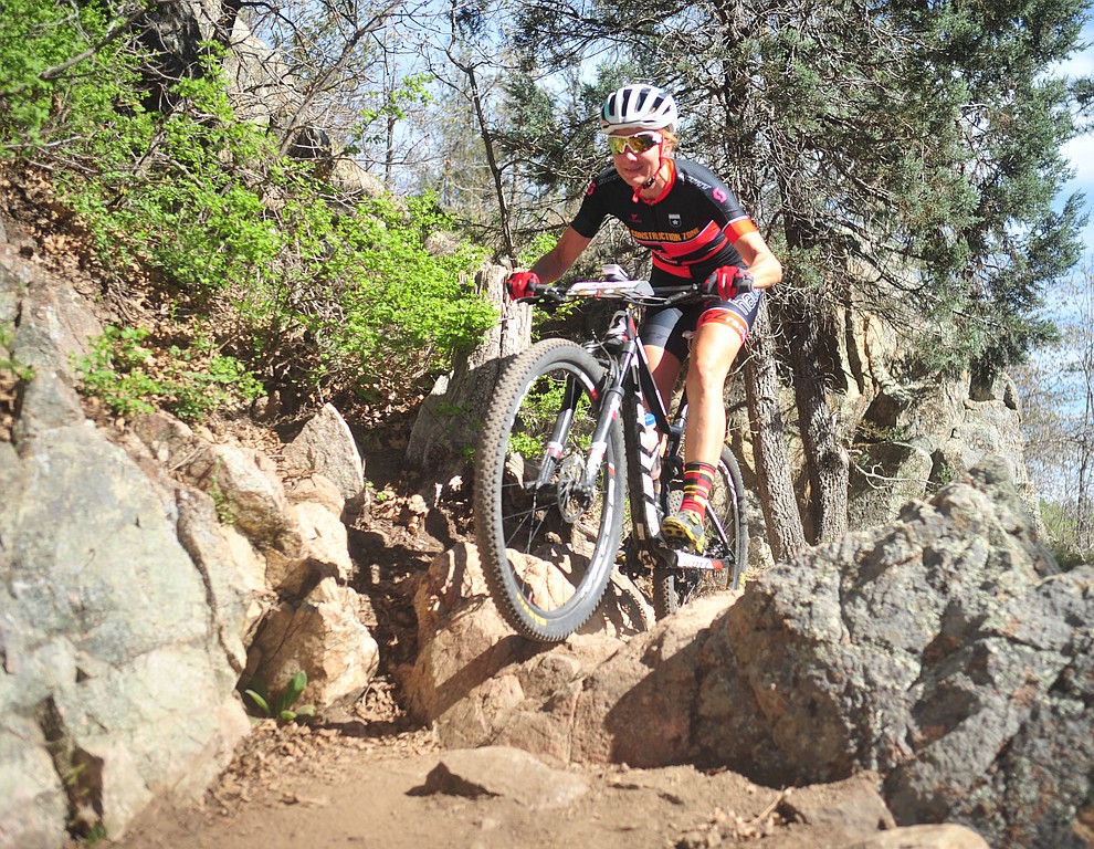 Construction Zone's Amy Chandos during the Whiskey Off Road Pro 50-mile cross country mountain bike race in Prescott Sunday, April 28. (Les Stukenberg/Courier)