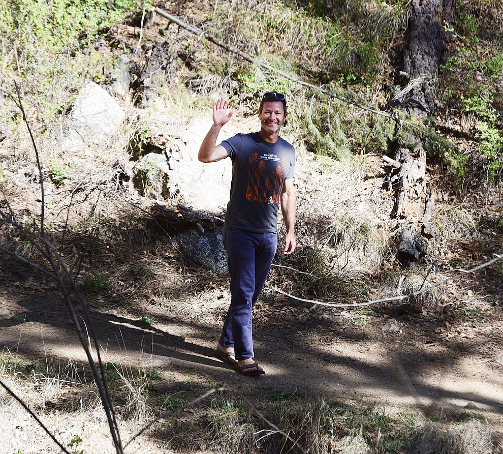 Epic Rides owner Todd Sadow checks out the trails during the Whiskey Off Road Pro 50-mile cross country mountain bike race in Prescott Sunday, April 28. (Les Stukenberg/Courier)