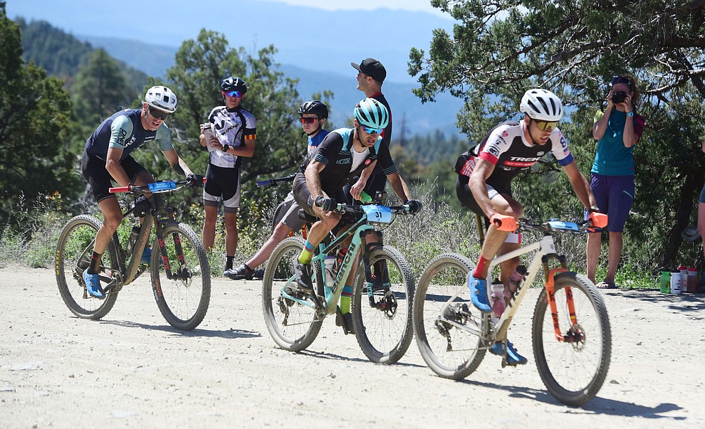 Nic Beechan, Alexy Vermeulen and Taylor Lideen during the Whiskey Off Road Pro 50-mile cross country mountain bike race in Prescott Sunday, April 28. (Les Stukenberg/Courier)