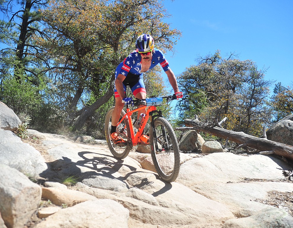 Orane Seal's Payson McElveen during the Whiskey Off Road Pro 50-mile cross country mountain bike race in Prescott Sunday, April 28. (Les Stukenberg/Courier)