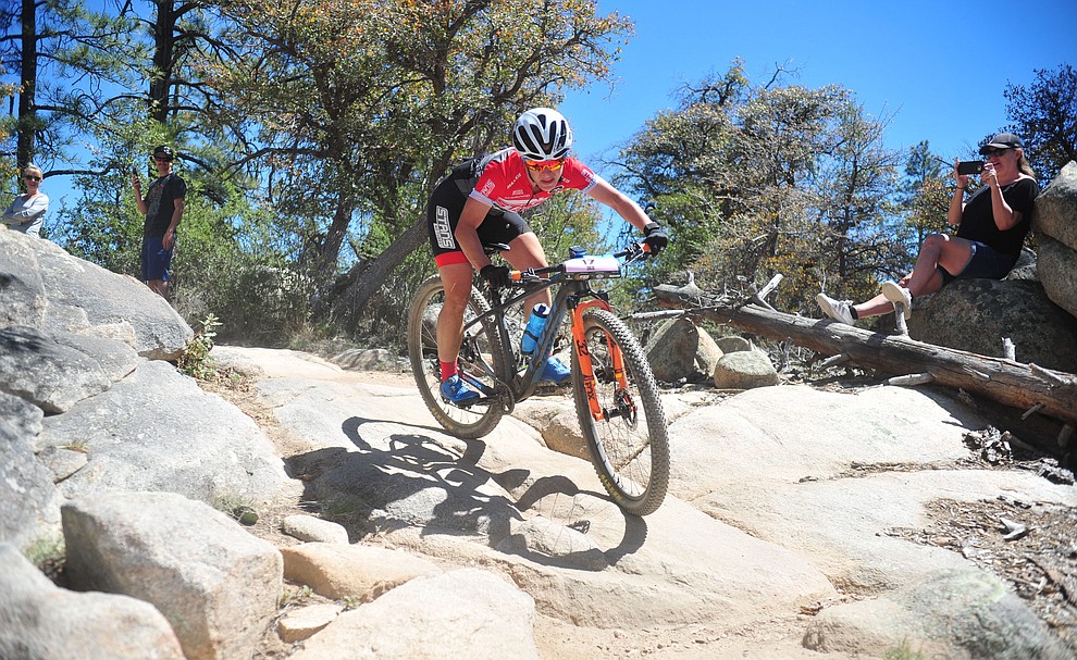 Stans Pivot rider Chloe Woodruff during the Whiskey Off Road Pro 50-mile cross country mountain bike race in Prescott Sunday, April 28. (Les Stukenberg/Courier)