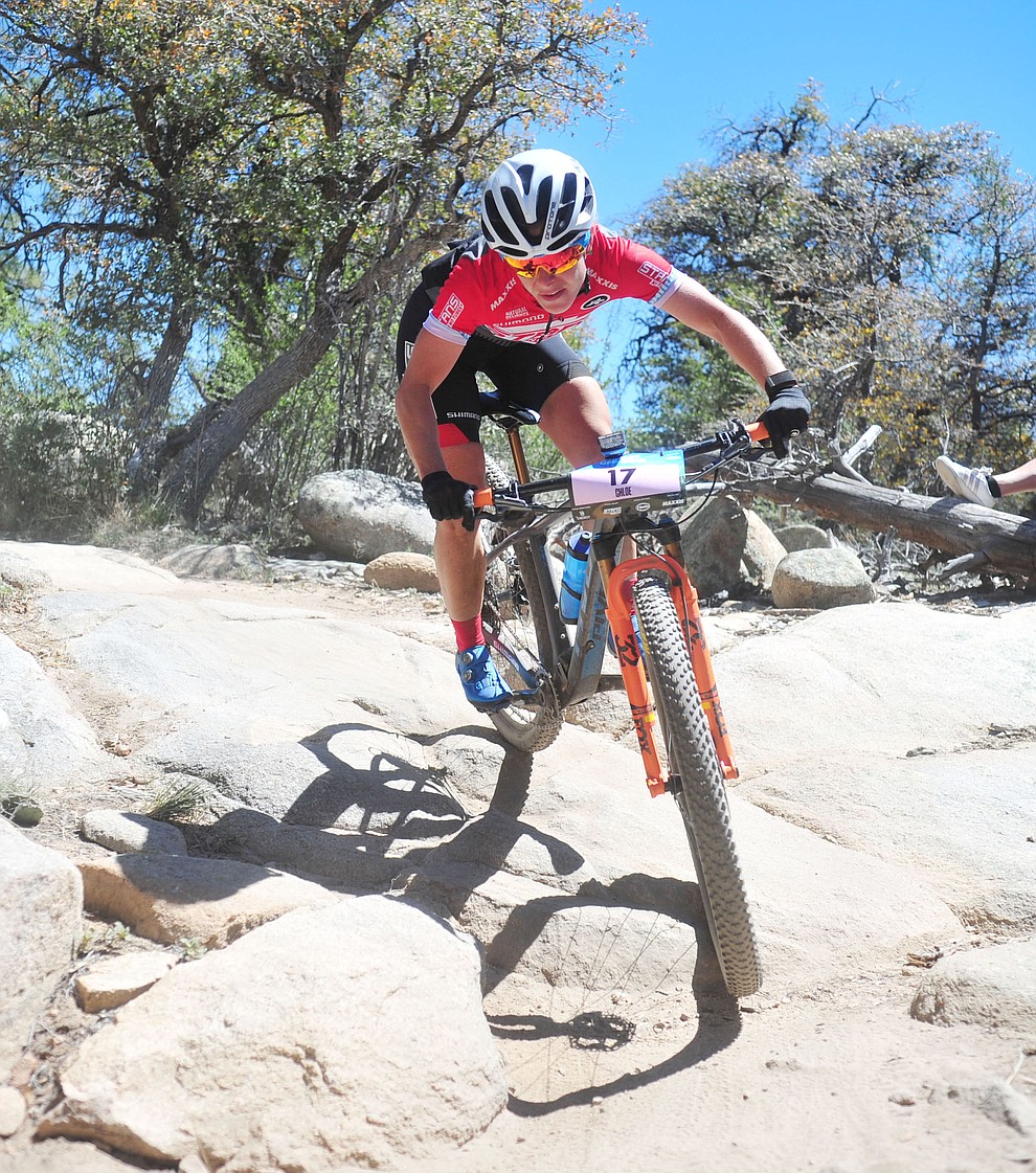 Stans Pivot rider Chloe Woodruff during the Whiskey Off Road Pro 50-mile cross country mountain bike race in Prescott Sunday, April 28. (Les Stukenberg/Courier)
