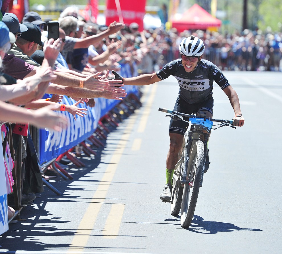 Georwill Perez Roman finshes third in the Whiskey Off Road Pro 50-mile cross country mountain bike race in Prescott Sunday, April 28. (Les Stukenberg/Courier)