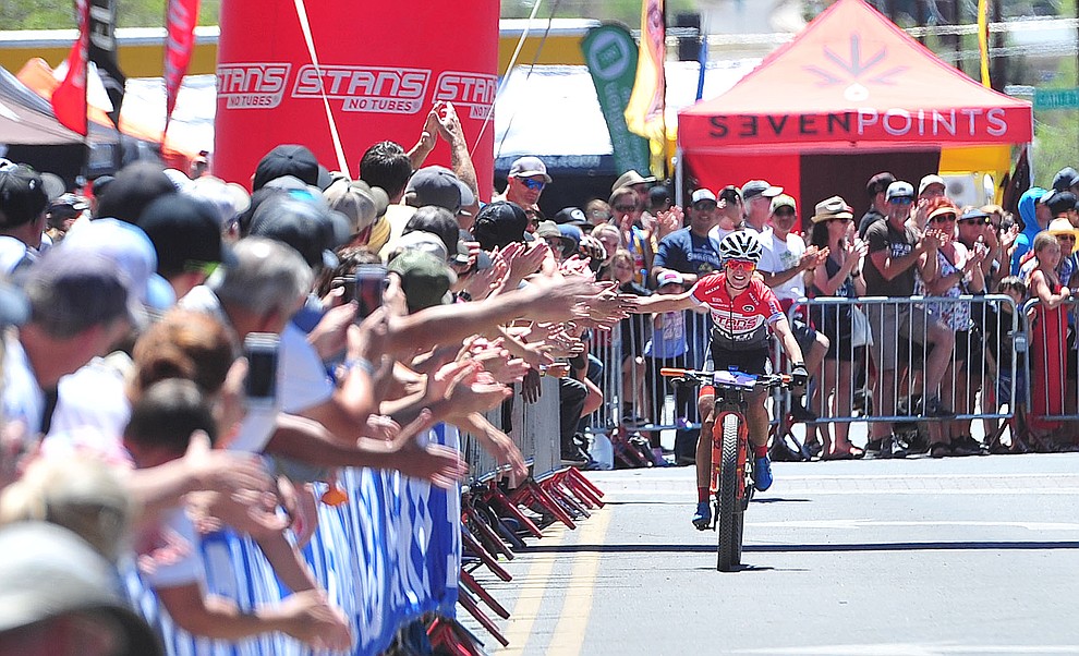 Stans Pivot's Chloe Woodruff finshes second at the Whiskey Off Road Pro 50-mile cross country mountain bike race in Prescott Sunday, April 28. (Les Stukenberg/Courier)