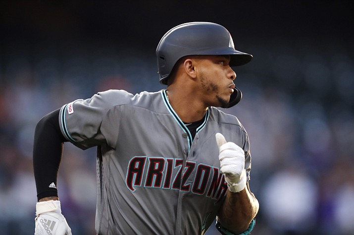 Arizona Diamondbacks' Ketel Marte heads up the first base line after hitting a two-run home run off Colorado Rockies starting pitcher Tyler Anderson in the third inning of a baseball game Friday, May 3, 2019, in Denver. (David Zalubowski/AP)