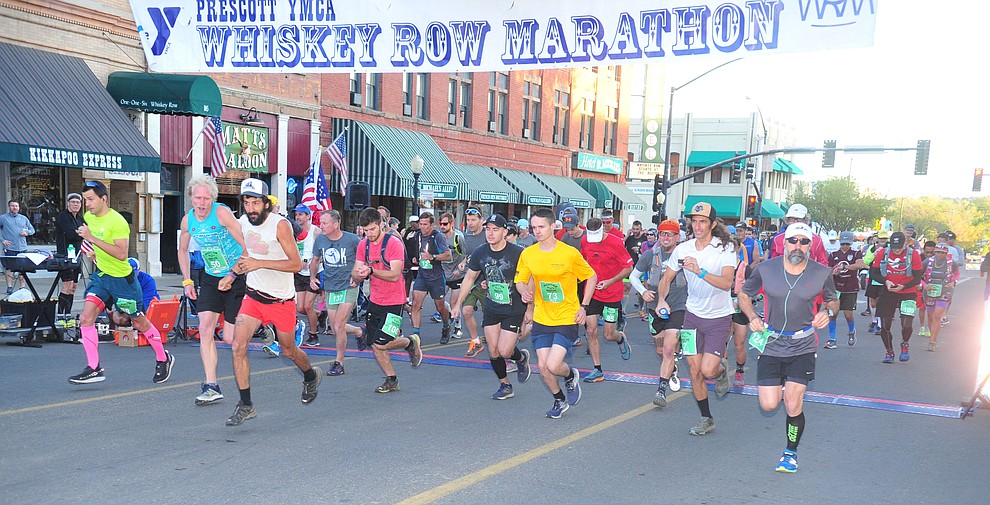 Marathon runners begin on Montezuma Street during the 41st annual Whiskey Row Marathon Saturday, May 4. (Les Stukenberg/Courier)