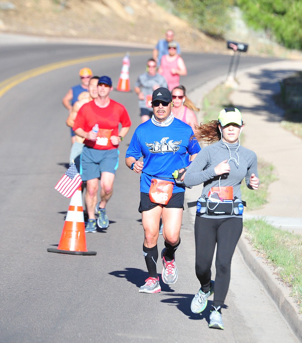 Half-marathon runners head up Hassyampa during the 41st annual Whiskey Row Marathon Saturday, May 4. (Les Stukenberg/Courier)