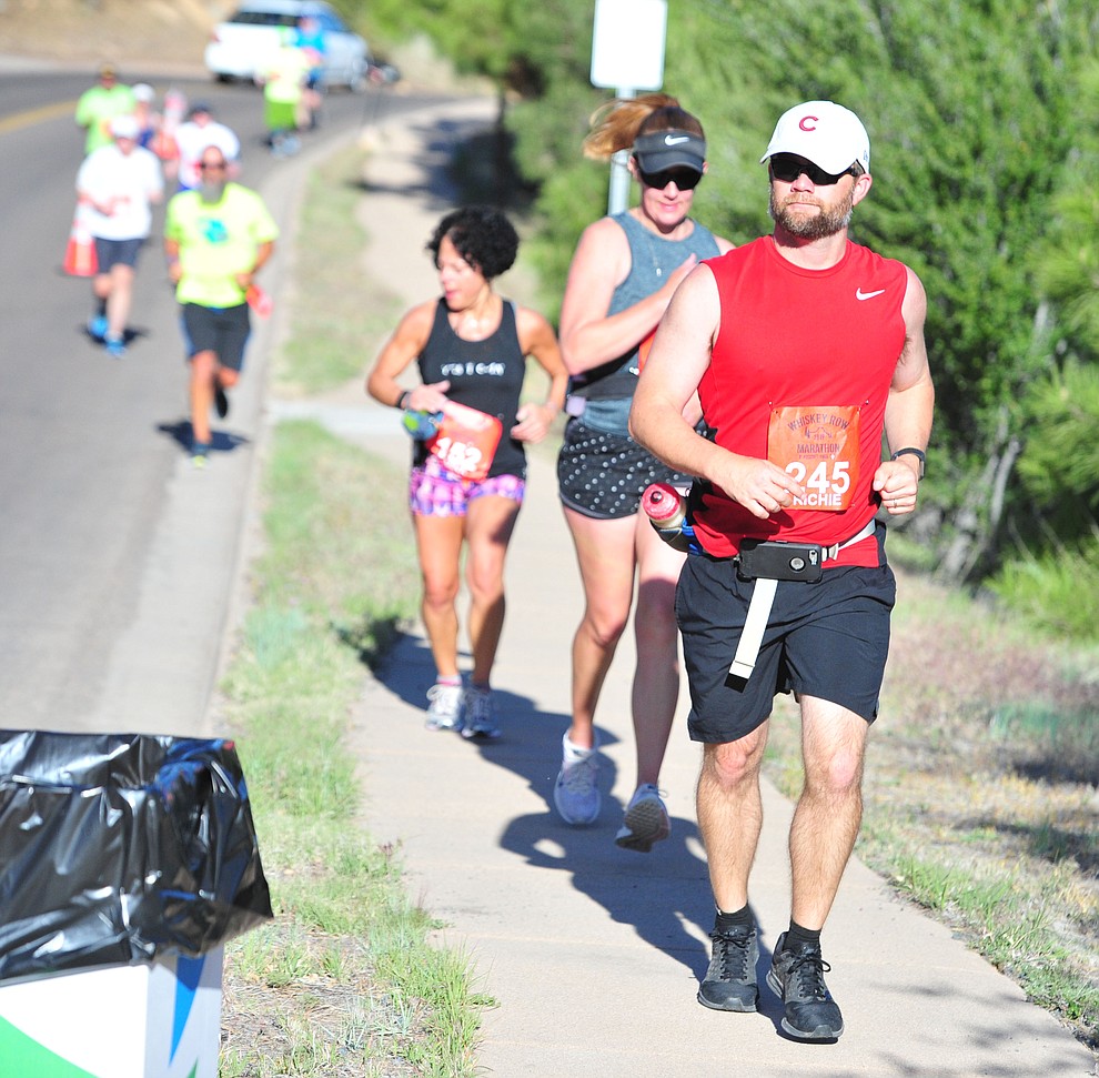 Half-marathon runners head up Hassyampa during the 41st annual Whiskey Row Marathon Saturday, May 4. (Les Stukenberg/Courier)