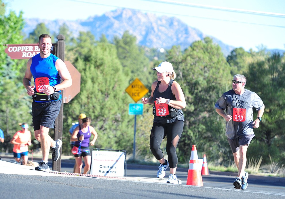 Half-marathon runners head up Copper Basin with Granite Mountain in the background during the 41st annual Whiskey Row Marathon Saturday, May 4. (Les Stukenberg/Courier)