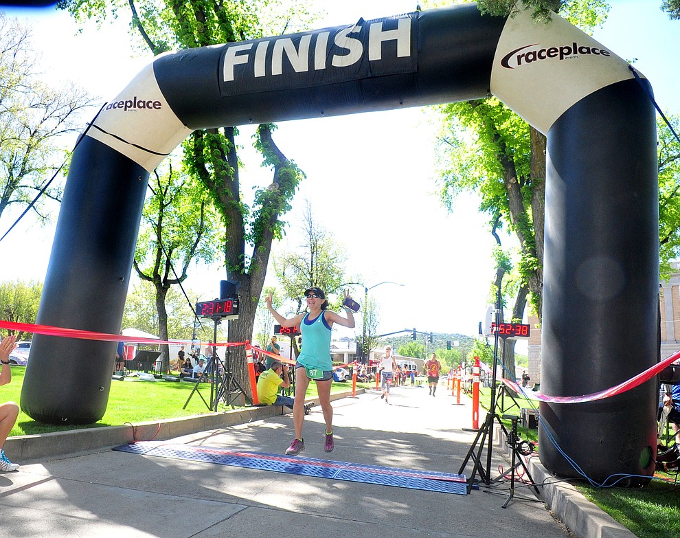 Tempe's Kassidy Bennett wins the womens marthon during the 41st annual Whiskey Row Marathon Saturday, May 4. (Les Stukenberg/Courier)