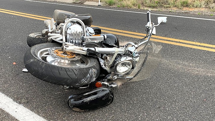 This Honda Valkyrie motorcycle was laying in the roadway with heavy damage. Medical personnel were treating the rider who was found below an embankment after being thrown from the motorcycle on Cornville Road Sunday. YCSO courtesy photo