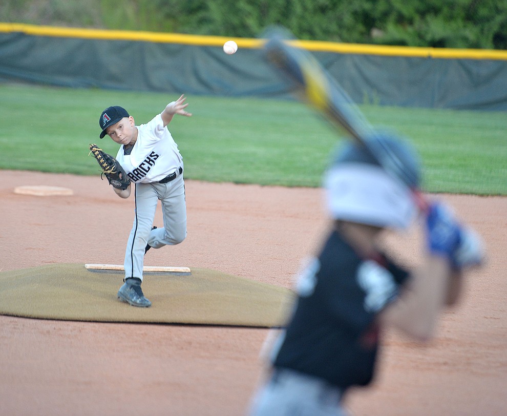 Trace Overton delivers a pitch during the Prescott Little League majors City Championship semi-final game Tuesday, May 14. (Les Stukenberg/Courier)