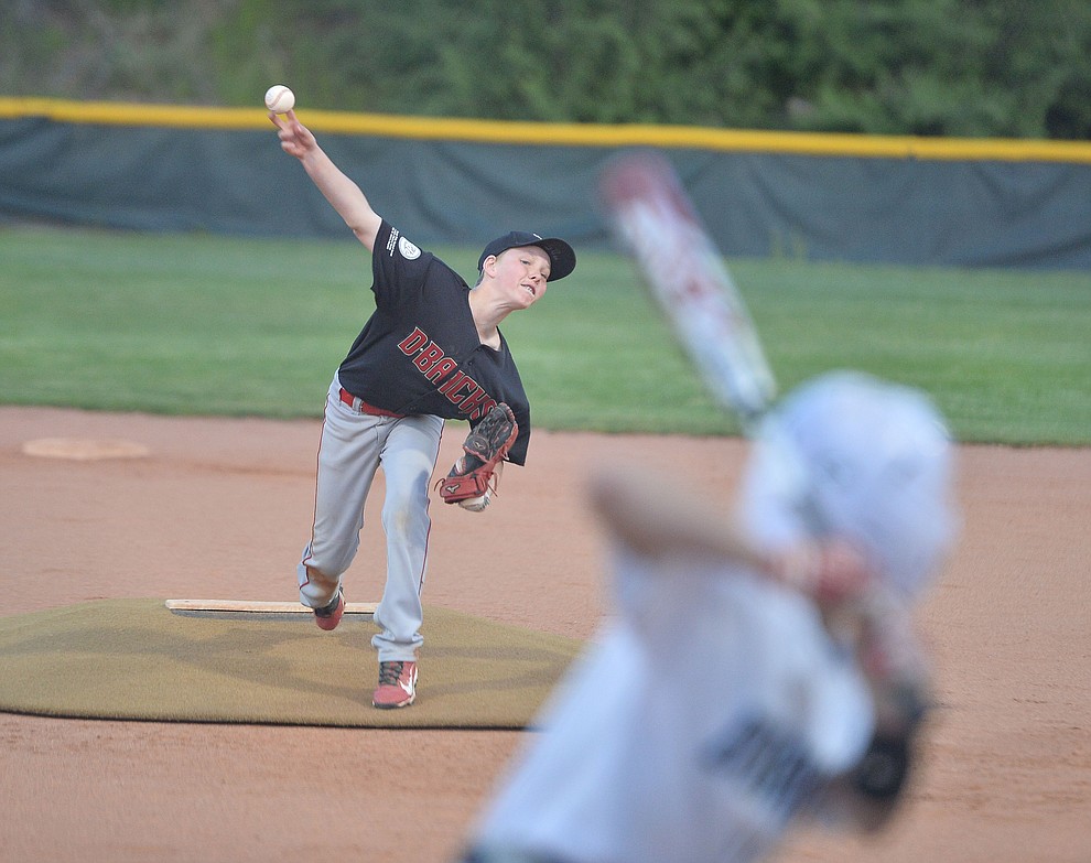 Adrian Sanderford delivers a pitch during the Prescott Little League majors City Championship semi-final game Tuesday, May 14. (Les Stukenberg/Courier)
